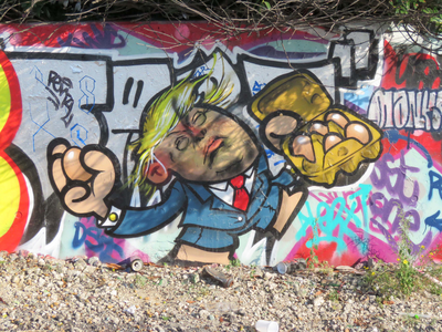 833749 Afbeelding van graffiti met de Amerikaanse president Donald Trump die eieren gaat gooien naar de Noord-Koreaanse ...